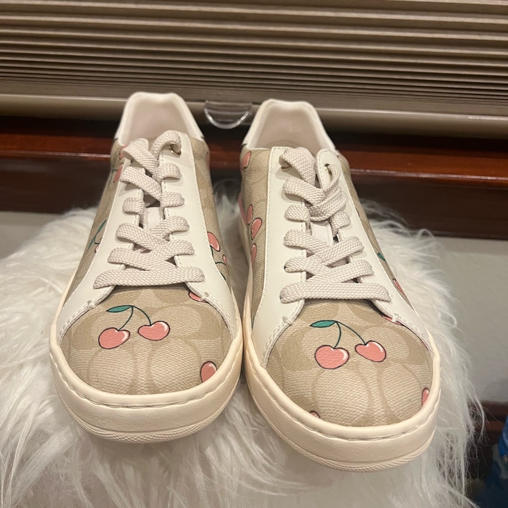 COACH Clip Low Top Sneaker In Signature Canvas With Heart Cherry Print